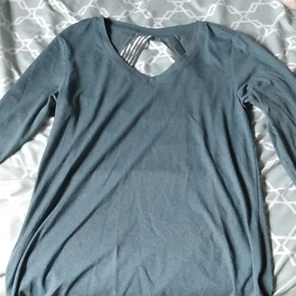 A long sleeve blue shirt
